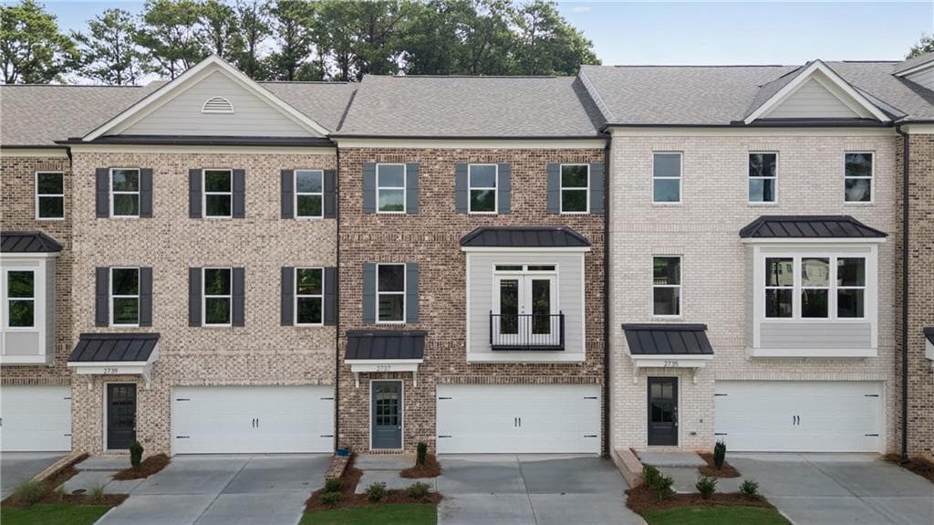 4 bedroom, 4 bathroom, 2,560 sq ft townhouse for sale at 2737 Hallwood Lane, Suwanee, GA 30024