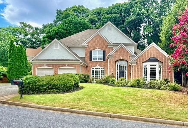 4 bedroom, 4 bathroom, 3,392 sq ft single family residence for sale at 1000 Winding Bridge Way, Johns Creek, GA 30097