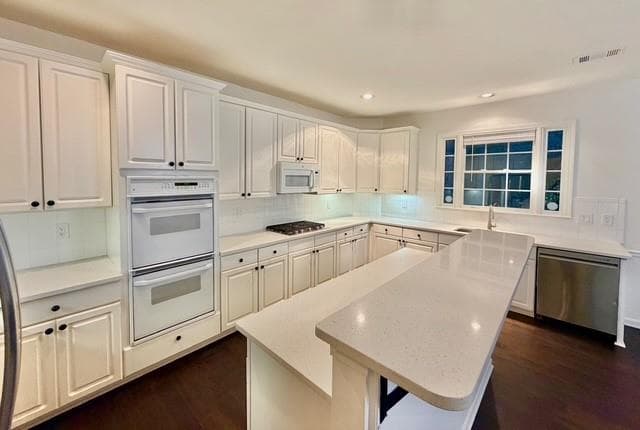 4 bedroom, 4 bathroom, 3,392 sq ft single family residence for sale at 1000 Winding Bridge Way, Johns Creek, GA 30097 — photo 3