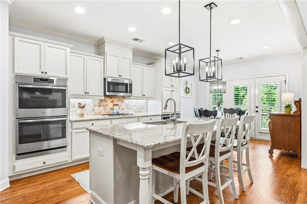 5 bedroom, 4 bathroom, 3,158 sq ft single family residence for sale at 5455 Fishermans Cove, Gainesville, GA 30506 — photo 9