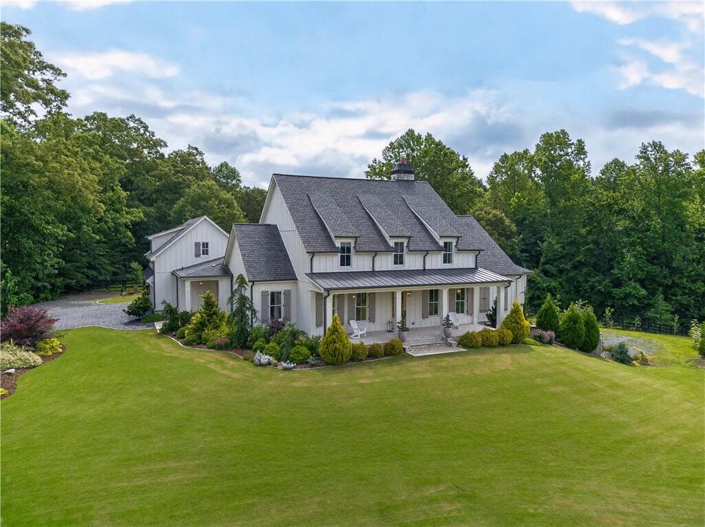 5 bedroom, 7 bathroom, 4,741 sq ft single family residence for sale at 1380 Newt Green Road, Cumming, GA 30028 — photo 1 of 73