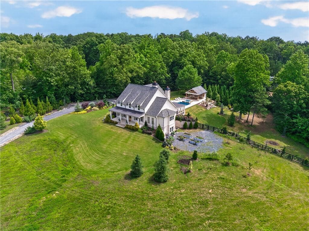 5 bedroom, 7 bathroom, 4,741 sq ft single family residence for sale at 1380 Newt Green Road, Cumming, GA 30028 — photo 2