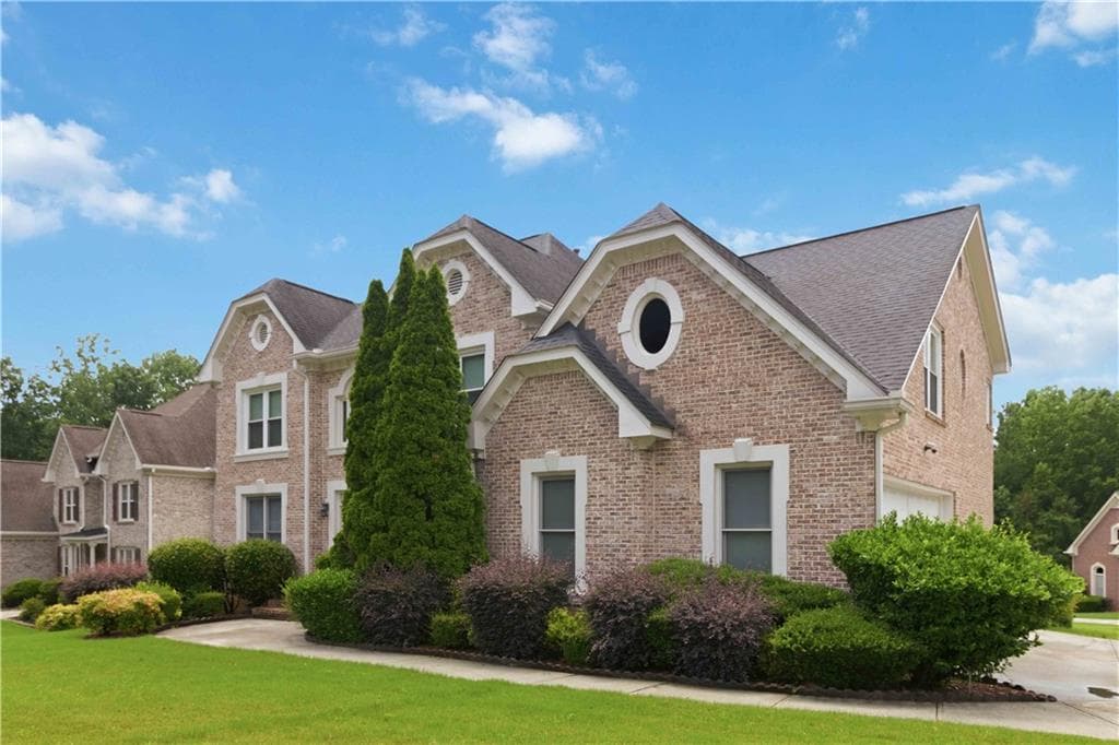 5 bedroom, 4 bathroom, 3,448 sq ft single family residence for sale at 3031 Cadbury Trail, Snellville, GA 30039 — photo 3