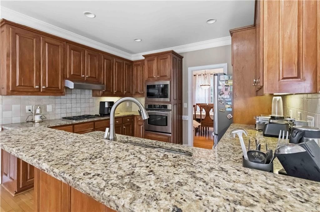 5 bedroom, 4 bathroom, 3,448 sq ft single family residence for sale at 3031 Cadbury Trail, Snellville, GA 30039 — photo 10