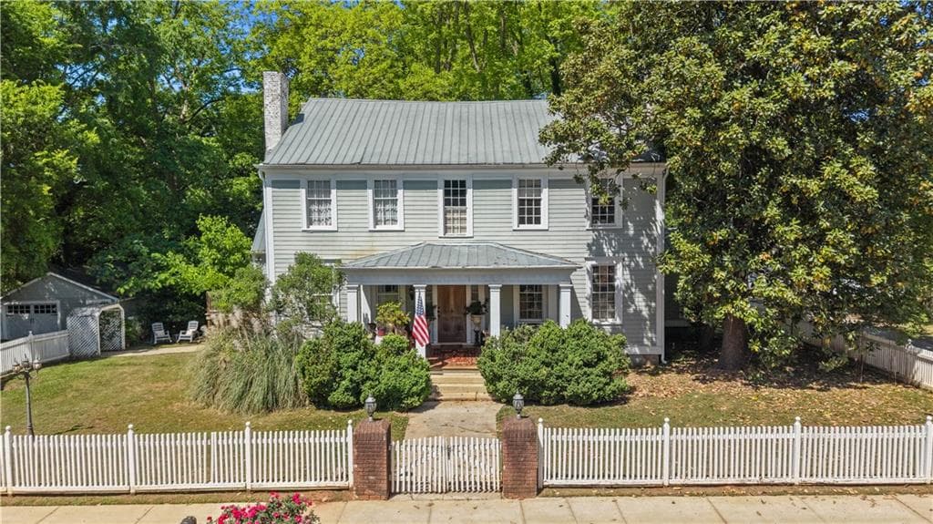 5 bedroom, 5 bathroom, 5,138 sq ft single family residence for sale at 403 S Main Street, Greensboro, GA 30642 — photo 2