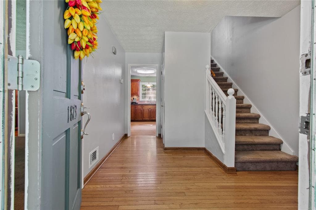 4 bedroom, 3 bathroom, 2,732 sq ft single family residence for sale at 1873 RAINTREE Court, Snellville, GA 30078 — photo 5