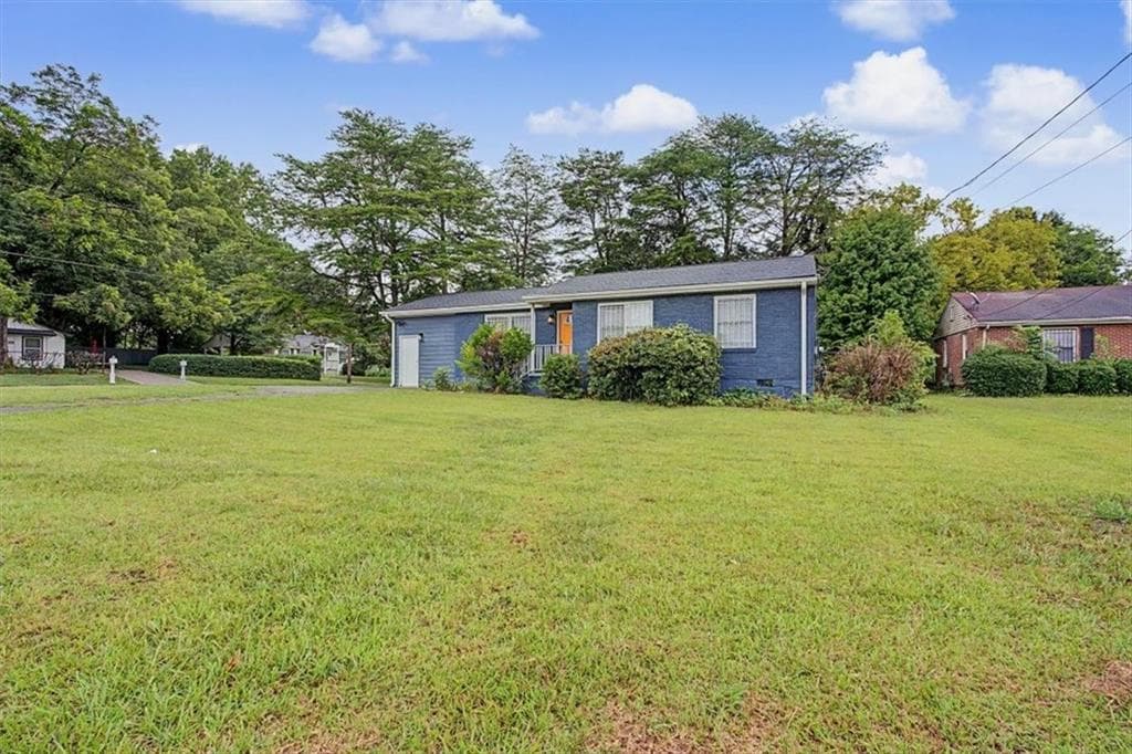 3 bedroom, 1 bathroom, 1,192 sq ft single family residence for sale at 1400 Columbia Drive, Decatur, GA 30032 — photo 2