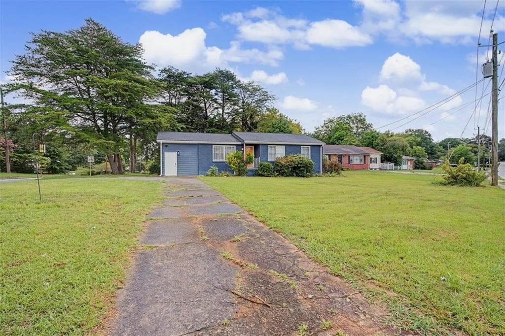 3 bedroom, 1 bathroom, 1,192 sq ft single family residence for sale at 1400 Columbia Drive, Decatur, GA 30032 — photo 3