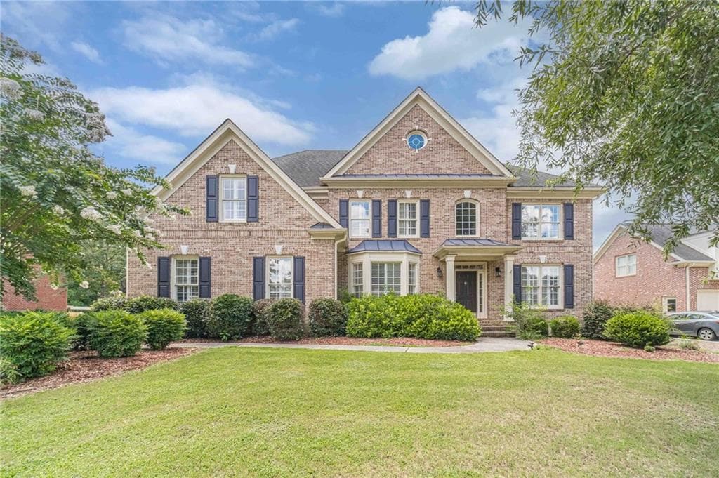 6 bedroom, 5 bathroom, 5,619 sq ft single family residence for sale at 562 Grassmeade Way, Snellville, GA 30078