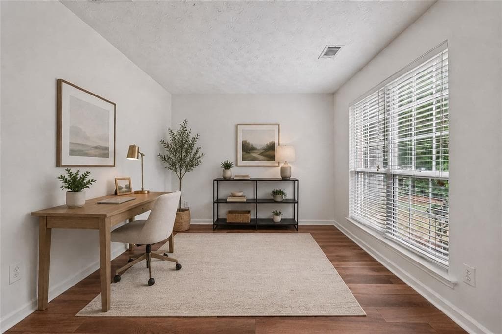 4 bedroom, 3 bathroom, 2,210 sq ft single family residence for sale at 5790 Woodstone Drive, Cumming, GA 30028 — photo 4