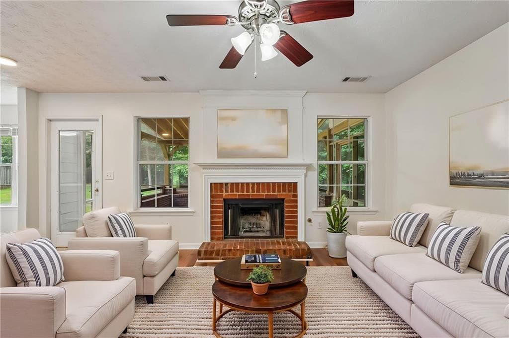 4 bedroom, 3 bathroom, 2,210 sq ft single family residence for sale at 5790 Woodstone Drive, Cumming, GA 30028 — photo 5