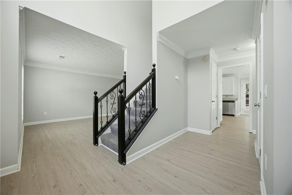 4 bedroom, 3 bathroom, 2,550 sq ft single family residence for sale at 2625 Lindsey Oak Lane, Lawrenceville, GA 30044 — photo 2