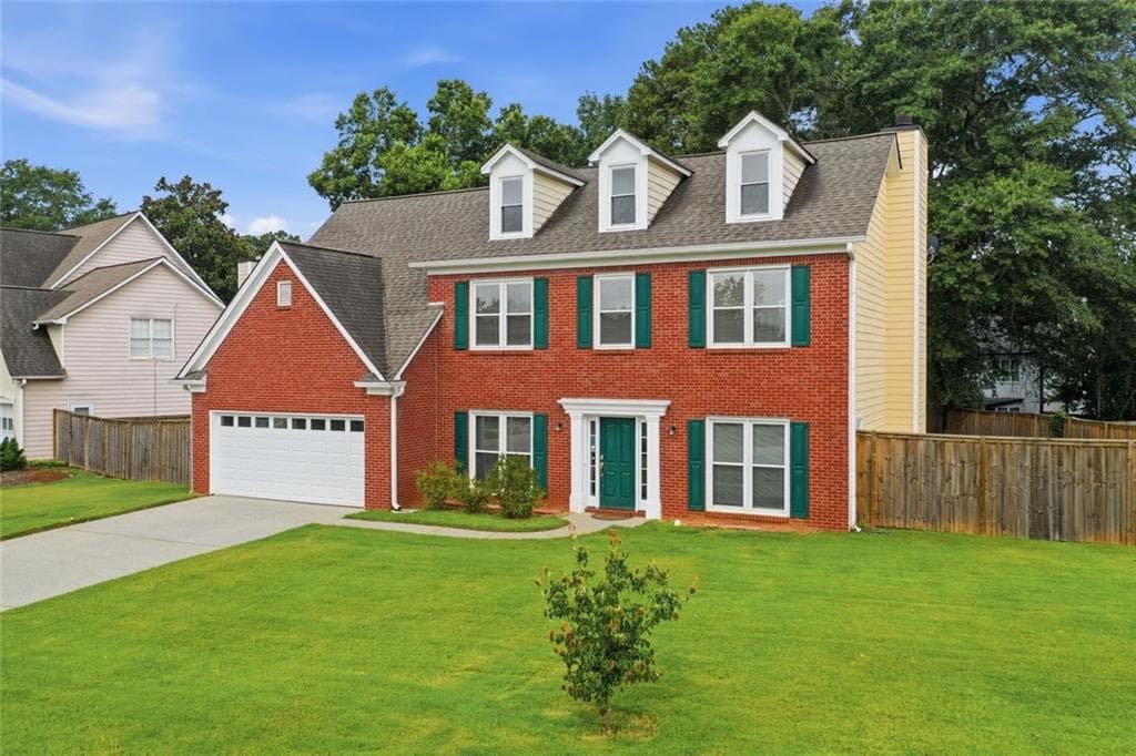 4 bedroom, 3 bathroom, 2,512 sq ft single family residence for sale at 1660 Calvin Davis Circle, Lawrenceville, GA 30043 — photo 6