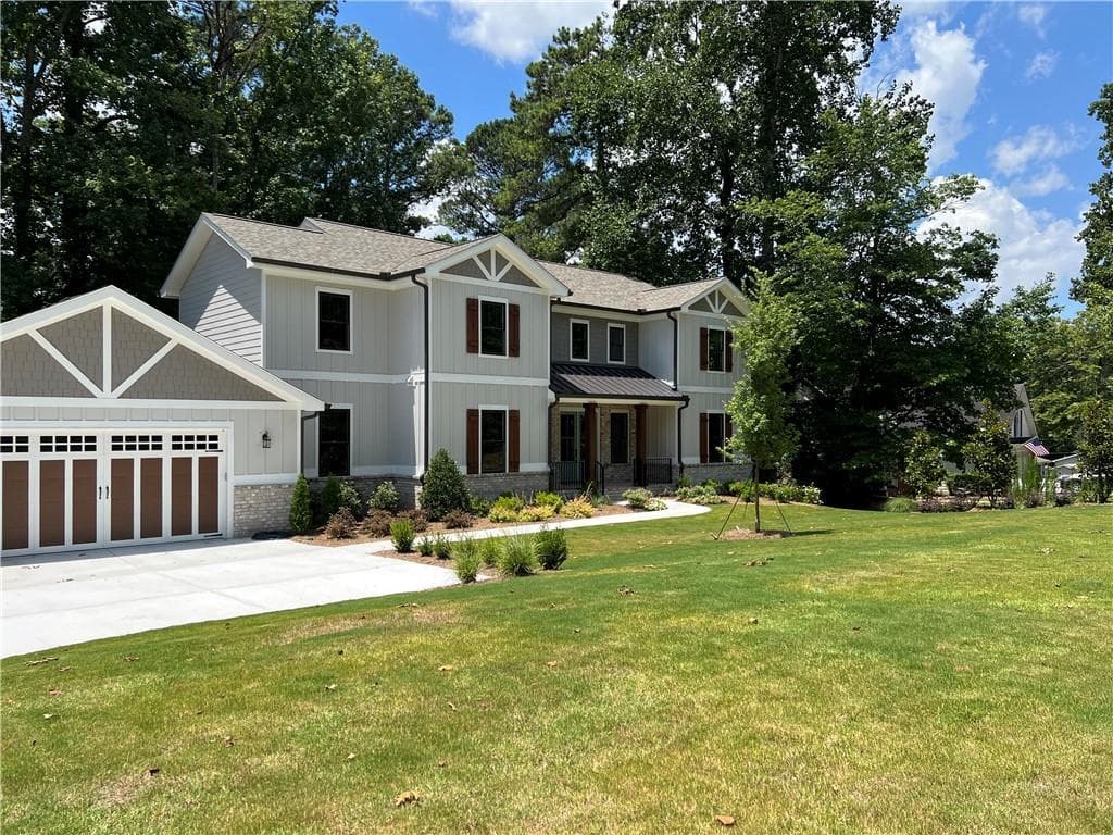 5 bedroom, 4 bathroom, 5,526 sq ft single family residence for sale at 6054 Stewart Road, Buford, GA 30518 — photo 3