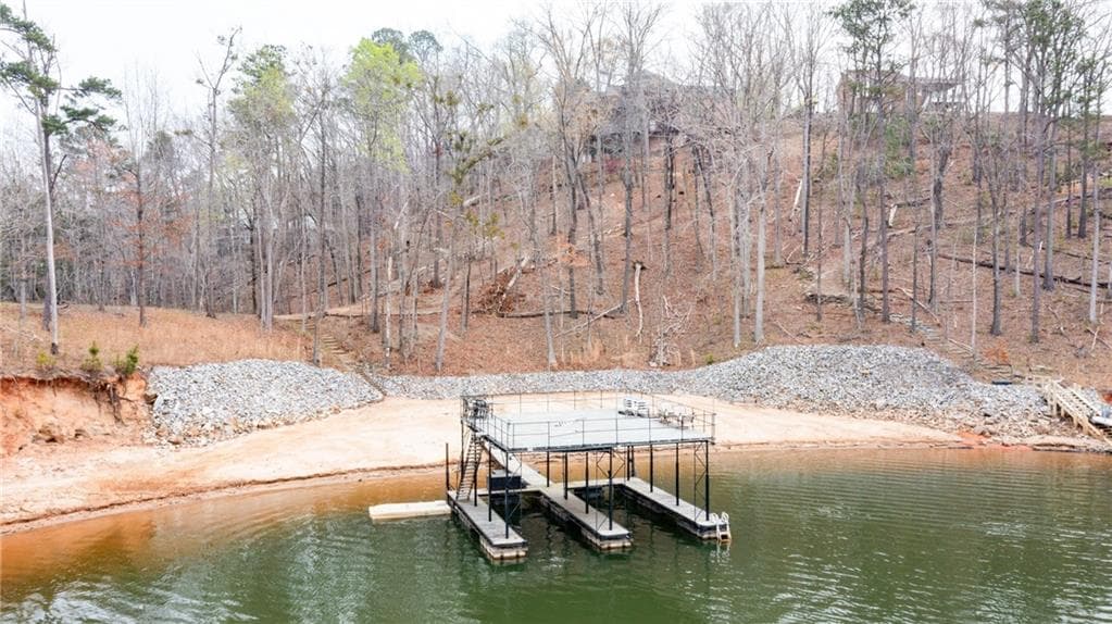 4 bedroom, 4 bathroom, 6,892 sq ft single family residence for sale at 6462 Waterscape Ridge, Gainesville, GA 30506 — photo 2