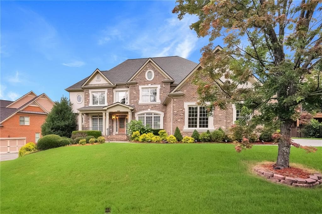 6 bedroom, 6 bathroom, 6,489 sq ft single family residence for sale at 2552 Stone Manor Drive, Buford, GA 30519 — photo 2