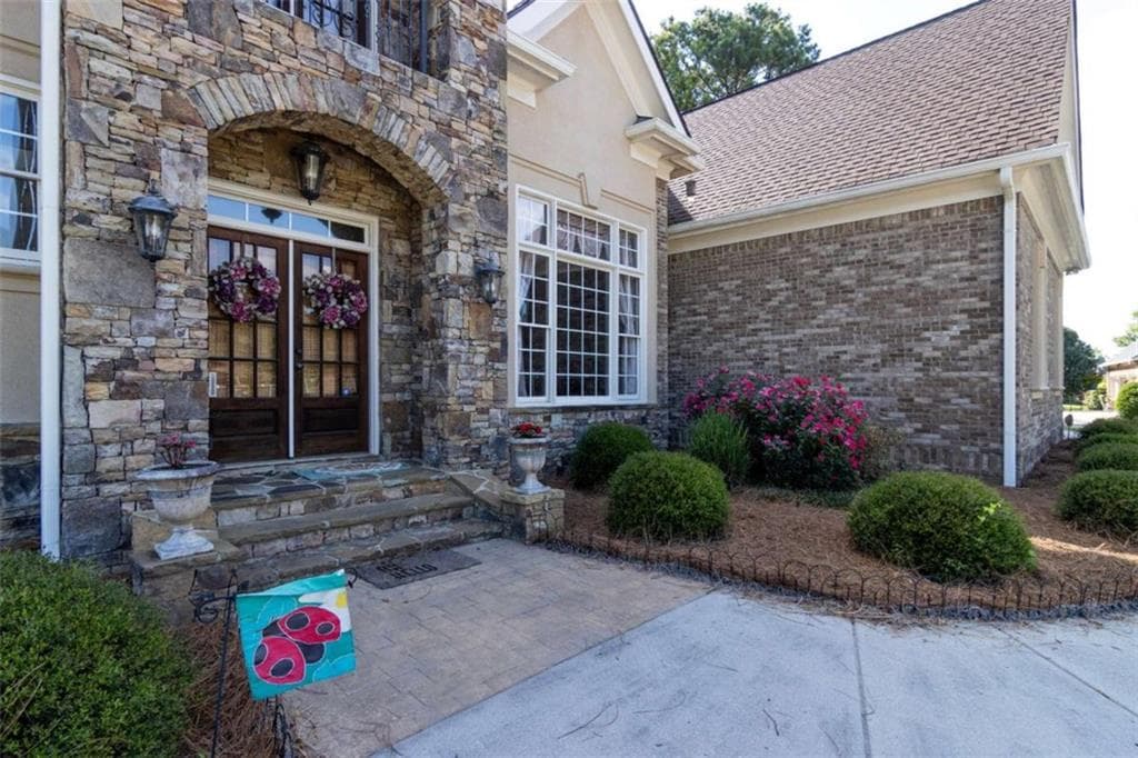 6 bedroom, 6 bathroom, 8,000 sq ft single family residence for sale at 105 Muirfield Way, Carrollton, GA 30116 — photo 3