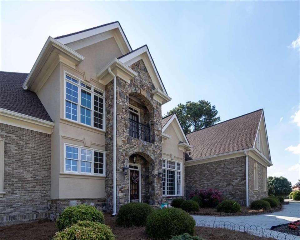 6 bedroom, 6 bathroom, 8,000 sq ft single family residence for sale at 105 Muirfield Way, Carrollton, GA 30116 — photo 4