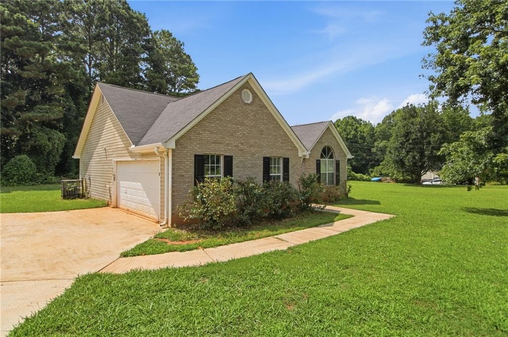 3 bedroom, 2 bathroom, 1,277 sq ft single family residence for sale at 1452 Stroud Road, Mcdonough, GA 30252 — photo 2