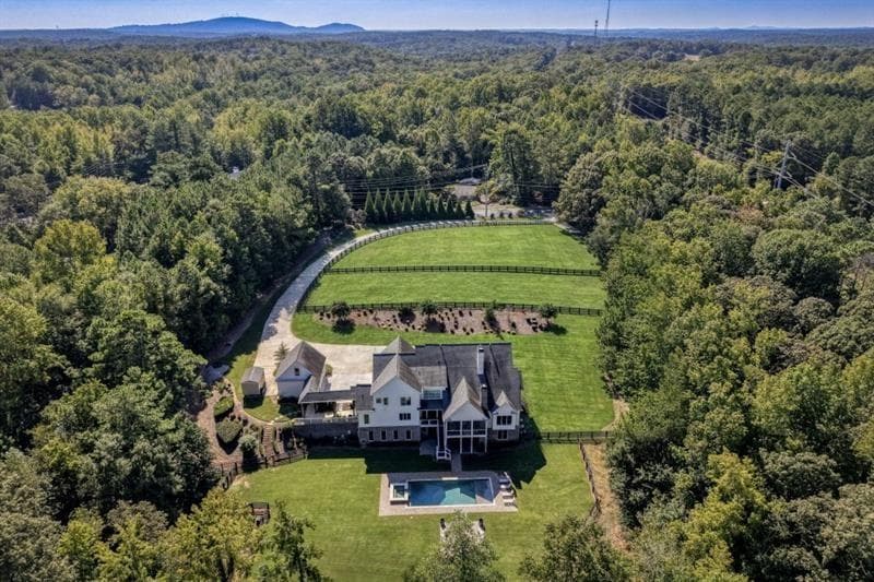 6 bedroom, 8 bathroom, 9,098 sq ft single family residence for sale at 13235 SE Arnold Mill Road, Roswell, GA 30075