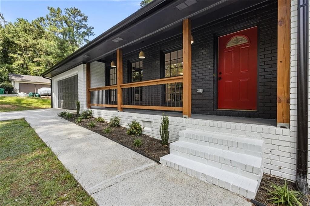 4 bedroom, 3 bathroom, 1,688 sq ft single family residence for sale at 5125 Flakes Mill Road, Ellenwood, GA 30294 — photo 3