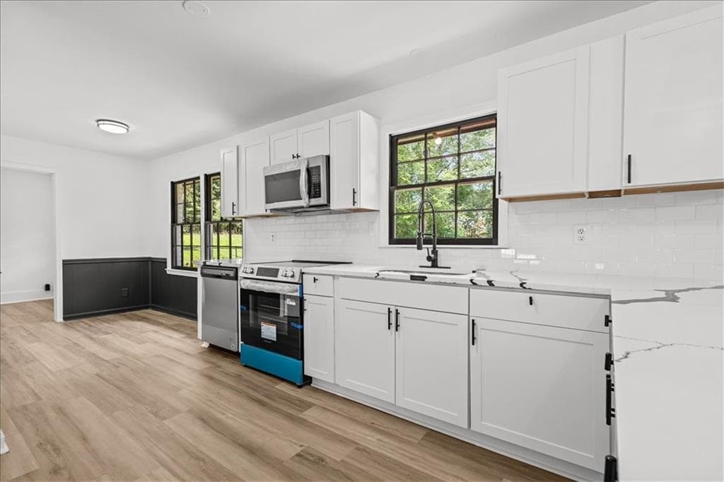 4 bedroom, 3 bathroom, 1,688 sq ft single family residence for sale at 5125 Flakes Mill Road, Ellenwood, GA 30294 — photo 8