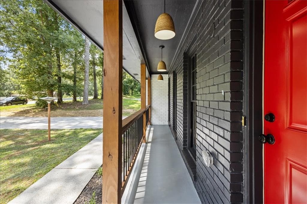 4 bedroom, 3 bathroom, 1,688 sq ft single family residence for sale at 5125 Flakes Mill Road, Ellenwood, GA 30294 — photo 4