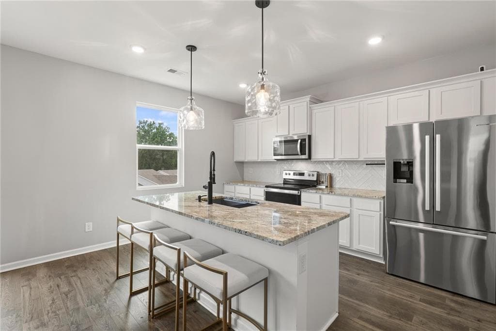 4 bedroom, 3 bathroom, 2,427 sq ft single family residence for sale at 391 Faulkner Street, Stockbridge, GA 30281 — photo 4