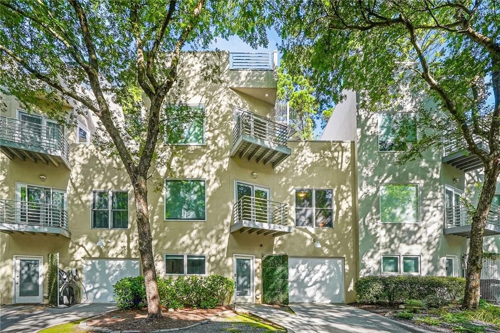 2 bedroom, 3 bathroom, 1,668 sq ft townhouse for sale at 2176 Millennium Way, Atlanta, GA 30319 — photo 1 of 36