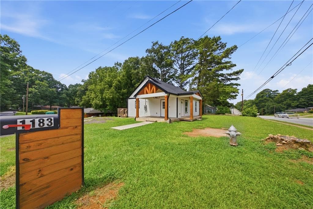 3 bedroom, 2 bathroom, 896 sq ft single family residence for sale at 1183 Highway 138, Jonesboro, GA 30236 — photo 2