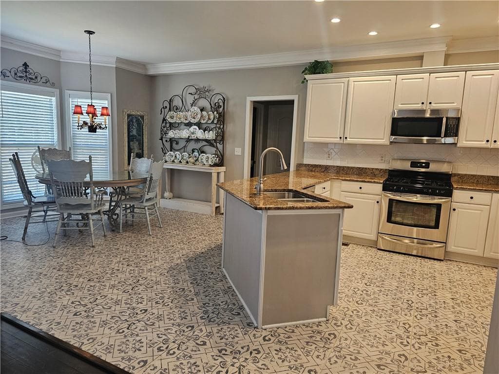 4 bedroom, 3 bathroom, 3,306 sq ft single family residence for sale at 1595 Saint Julian Street, Suwanee, GA 30024 — photo 9