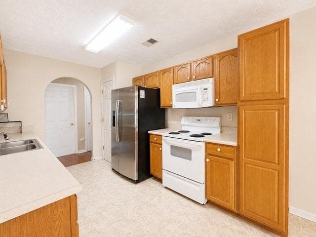 3 bedroom, 2 bathroom, 1,521 sq ft single family residence for sale at 4662 Huff Park Court, Snellville, GA 30039 — photo 4