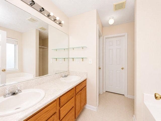3 bedroom, 2 bathroom, 1,521 sq ft single family residence for sale at 4662 Huff Park Court, Snellville, GA 30039 — photo 5