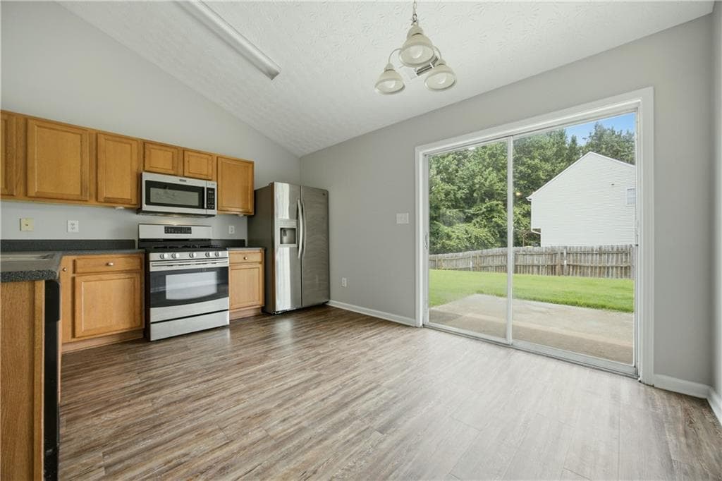 3 bedroom, 2 bathroom, 1,298 sq ft single family residence for rent at 1002 Pine Isle Court, Buford, GA 30518 for $2,100 a month — photo 3