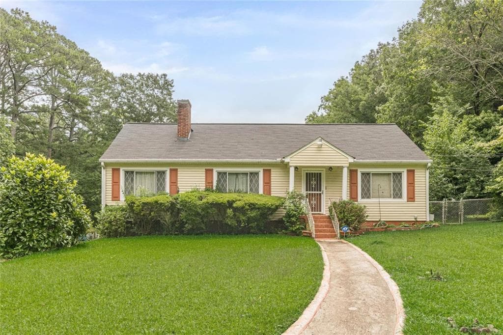4 bedroom, 2 bathroom, 1,920 sq ft single family residence for sale at 1940 Fairburn Road, Atlanta, GA 30331 — photo 4