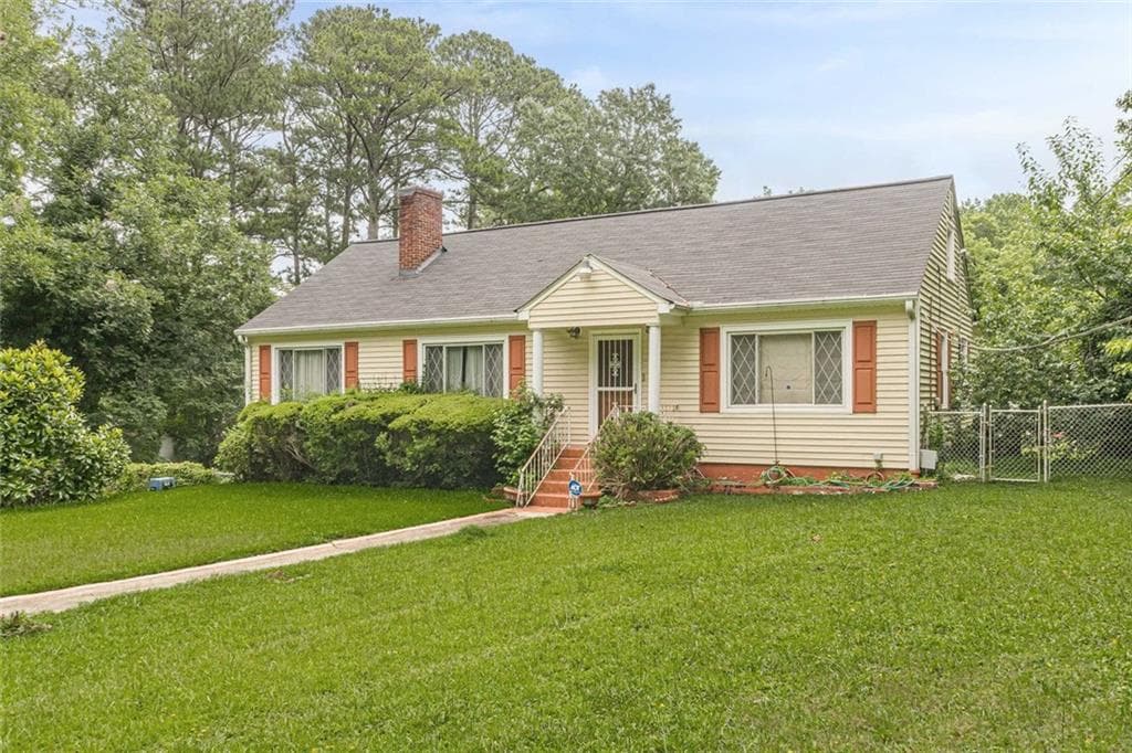 4 bedroom, 2 bathroom, 1,920 sq ft single family residence for sale at 1940 Fairburn Road, Atlanta, GA 30331 — photo 5