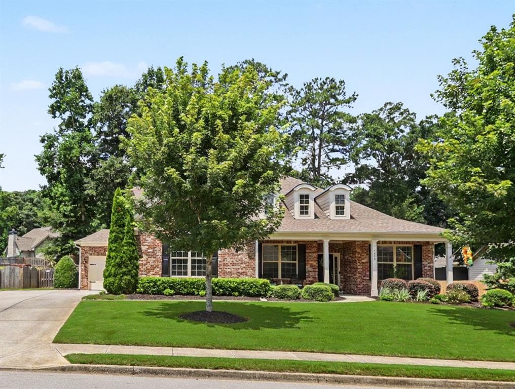 4 bedroom, 4 bathroom, 3,068 sq ft single family residence for sale at 1434 Highland Wood Court, Auburn, GA 30011 — photo 1 of 51