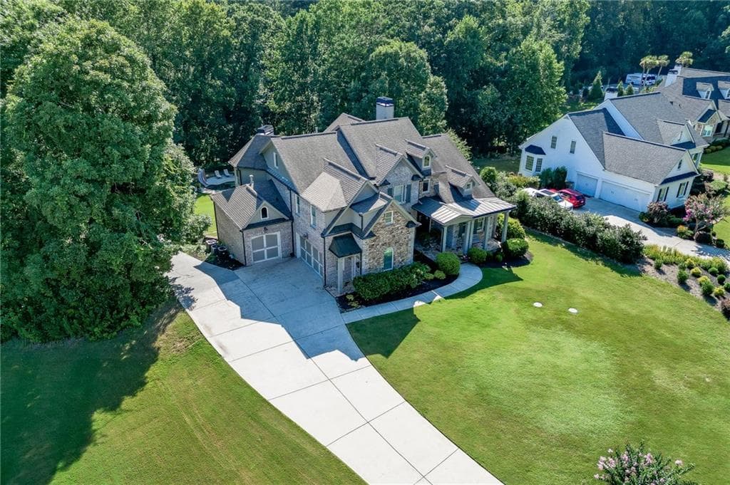 6 bedroom, 6 bathroom, 6,287 sq ft single family residence for sale at 1373 Mountain Lake Drive, Auburn, GA 30011