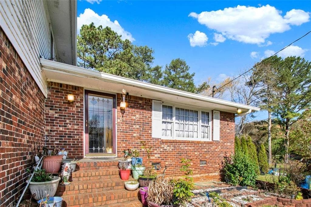 4 bedroom, 3 bathroom, 2,169 sq ft single family residence for sale at 1785 Poplar Street, Conyers, GA 30013 — photo 2