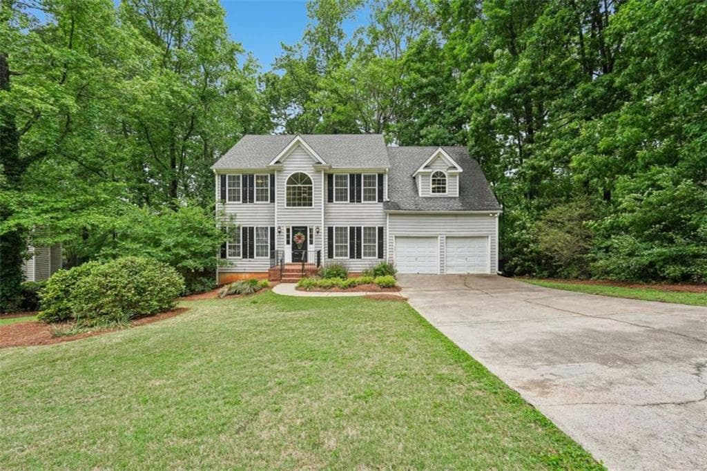 4 bedroom, 3 bathroom, 4,000 sq ft single family residence for sale at 5520 Tallantworth Trail, Cumming, GA 30040 — photo 1 of 34