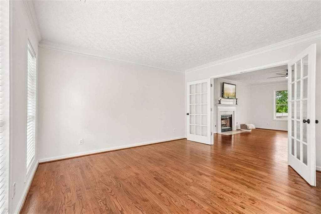 4 bedroom, 3 bathroom, 4,000 sq ft single family residence for sale at 5520 Tallantworth Trail, Cumming, GA 30040 — photo 4