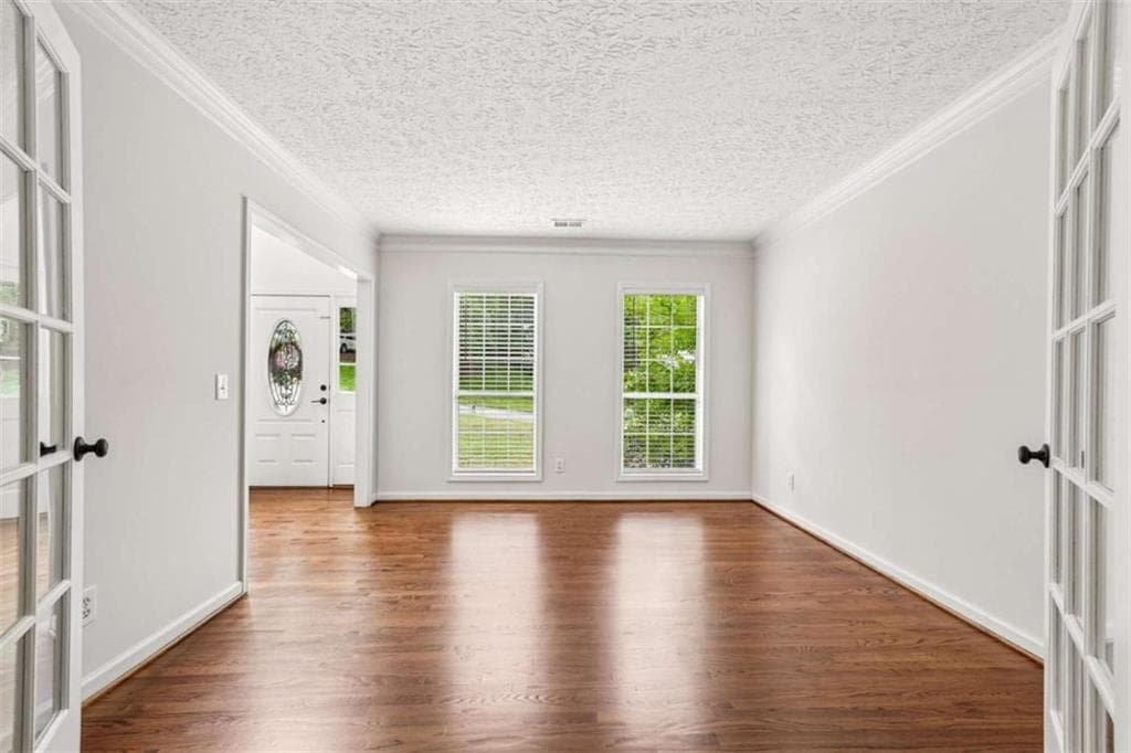 4 bedroom, 3 bathroom, 4,000 sq ft single family residence for sale at 5520 Tallantworth Trail, Cumming, GA 30040 — photo 5