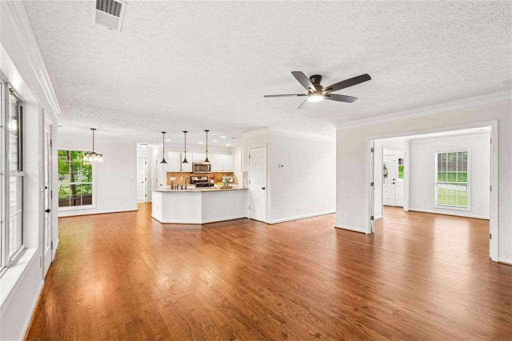 4 bedroom, 3 bathroom, 4,000 sq ft single family residence for sale at 5520 Tallantworth Trail, Cumming, GA 30040 — photo 8