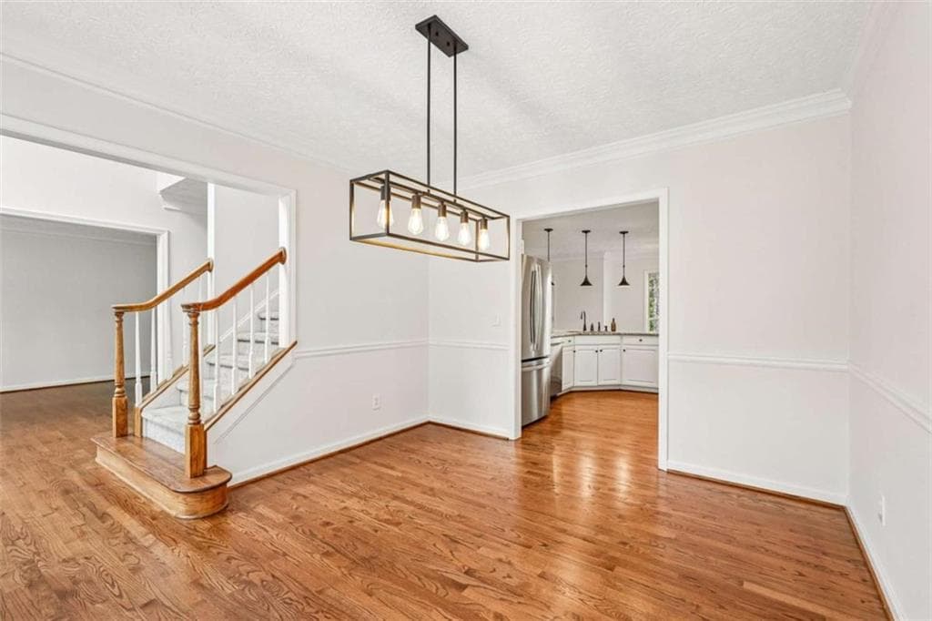 4 bedroom, 3 bathroom, 4,000 sq ft single family residence for sale at 5520 Tallantworth Trail, Cumming, GA 30040 — photo 9