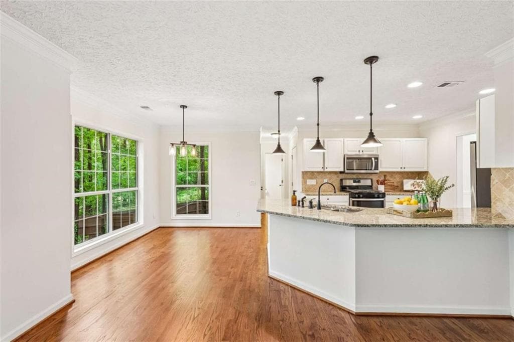 4 bedroom, 3 bathroom, 4,000 sq ft single family residence for sale at 5520 Tallantworth Trail, Cumming, GA 30040 — photo 10