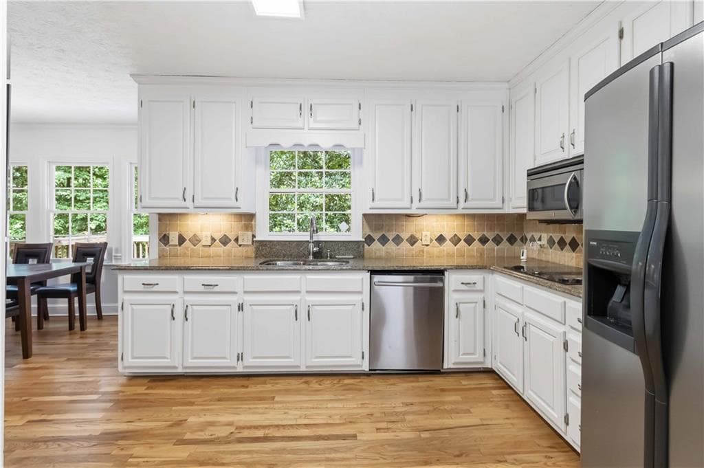 5 bedroom, 4 bathroom, 4,524 sq ft single family residence for sale at 275 Sageglen, Lawrenceville, GA 30044 — photo 8