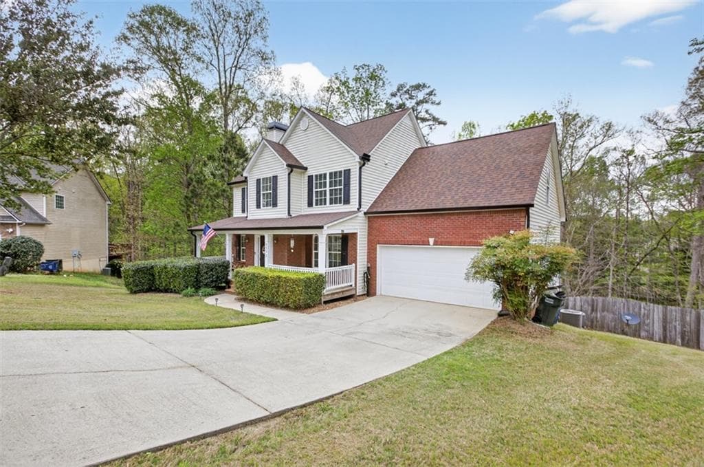4 bedroom, 3 bathroom, 2,046 sq ft single family residence for sale at 3512 Windy Oaks Way, Loganville, GA 30052 — photo 2