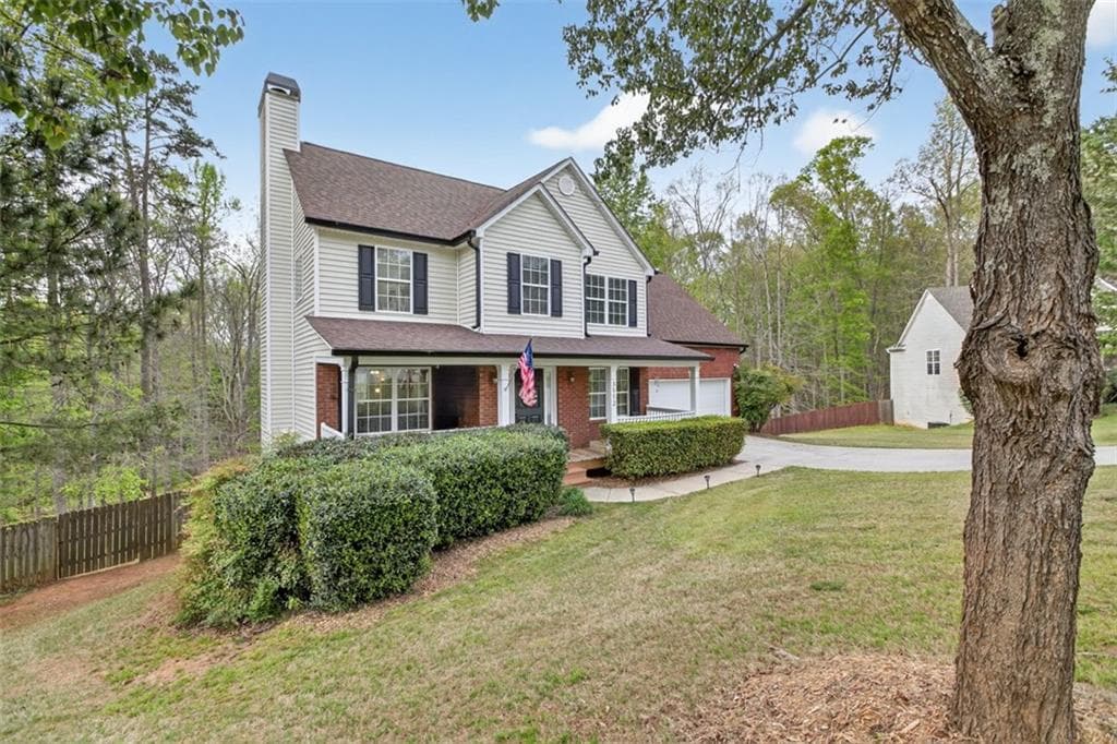 4 bedroom, 3 bathroom, 2,046 sq ft single family residence for sale at 3512 Windy Oaks Way, Loganville, GA 30052 — photo 4