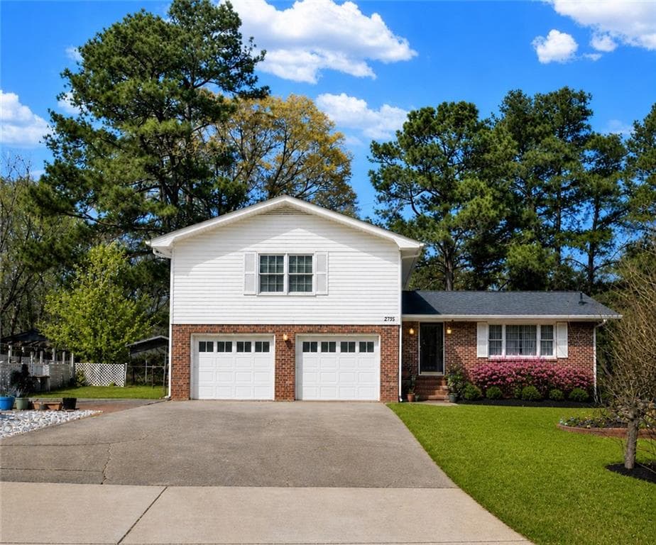 4 bedroom, 3 bathroom, 2,169 sq ft single family residence for sale at 1785 Poplar Street, Conyers, GA 30013 — photo 1 of 56