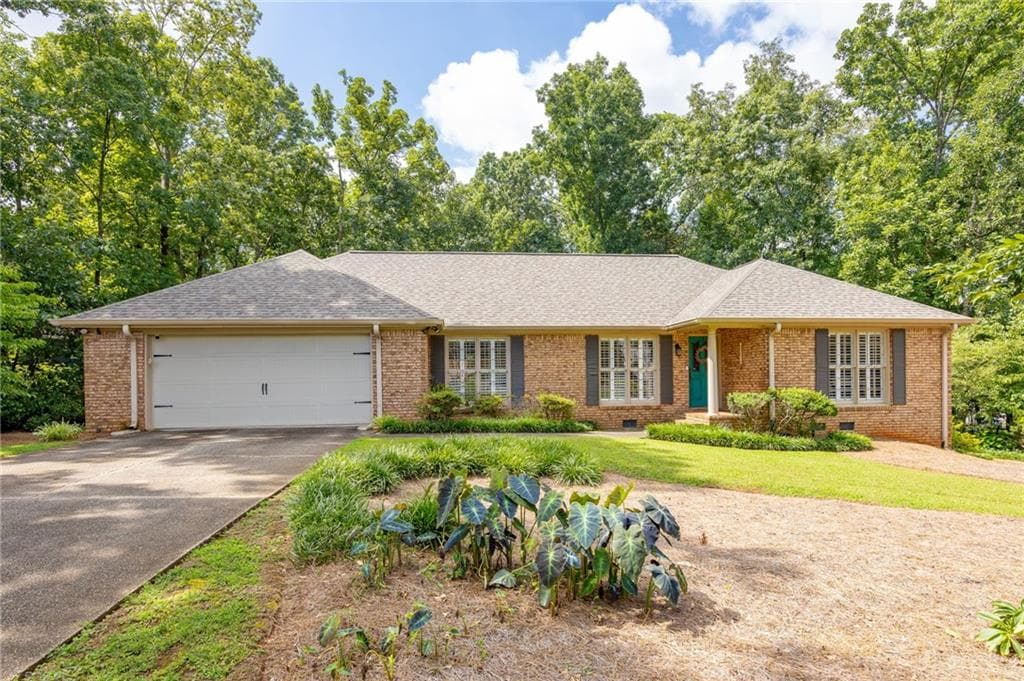 3 bedroom, 2 bathroom, 2,326 sq ft single family residence sold at 1656 Windcrest Drive, Marietta, GA 30064